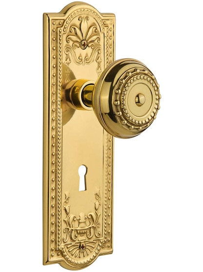 Meadows Door Set with Matching Knobs and Keyhole Single Dummy in Polished Brass.